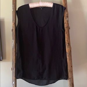 Sheer, black, sleeveless top.